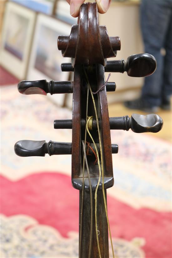 A full sized cello bearing label Arthur Richardson ... and two bows (one silver mounted), the other signed Wilhelm ... uhl